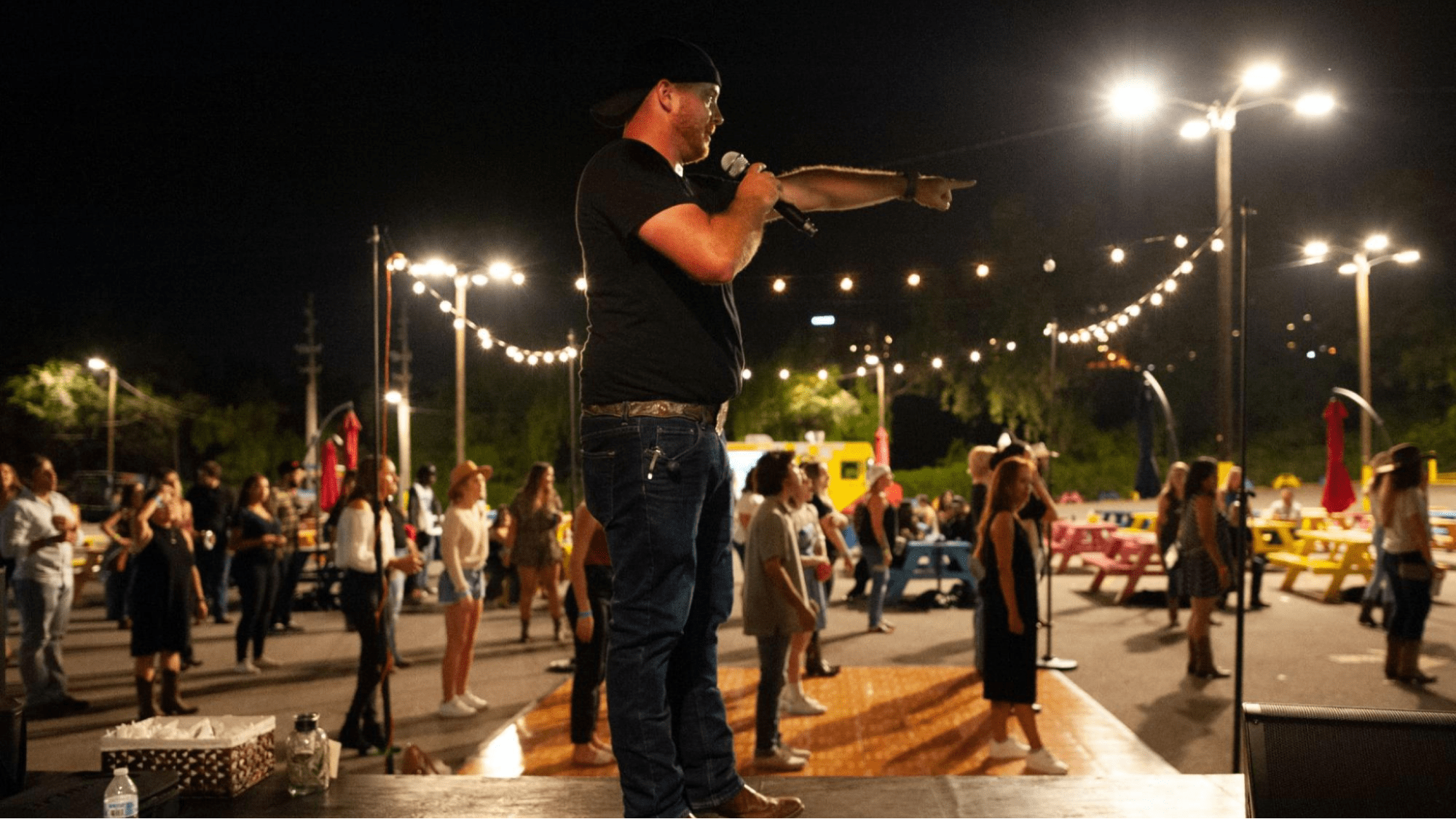 Attendees at a country music dance party