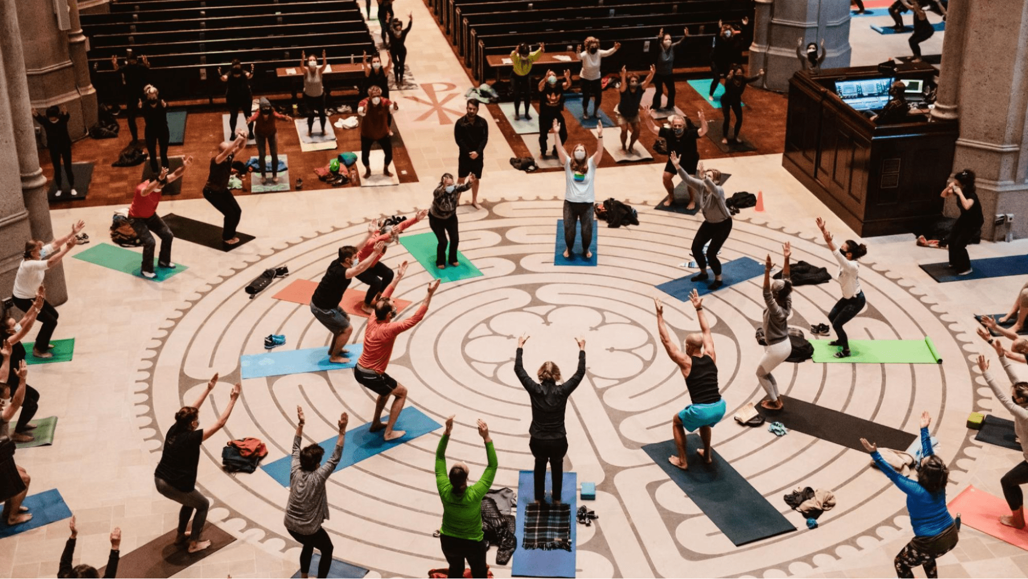 Event attendees doing yoga