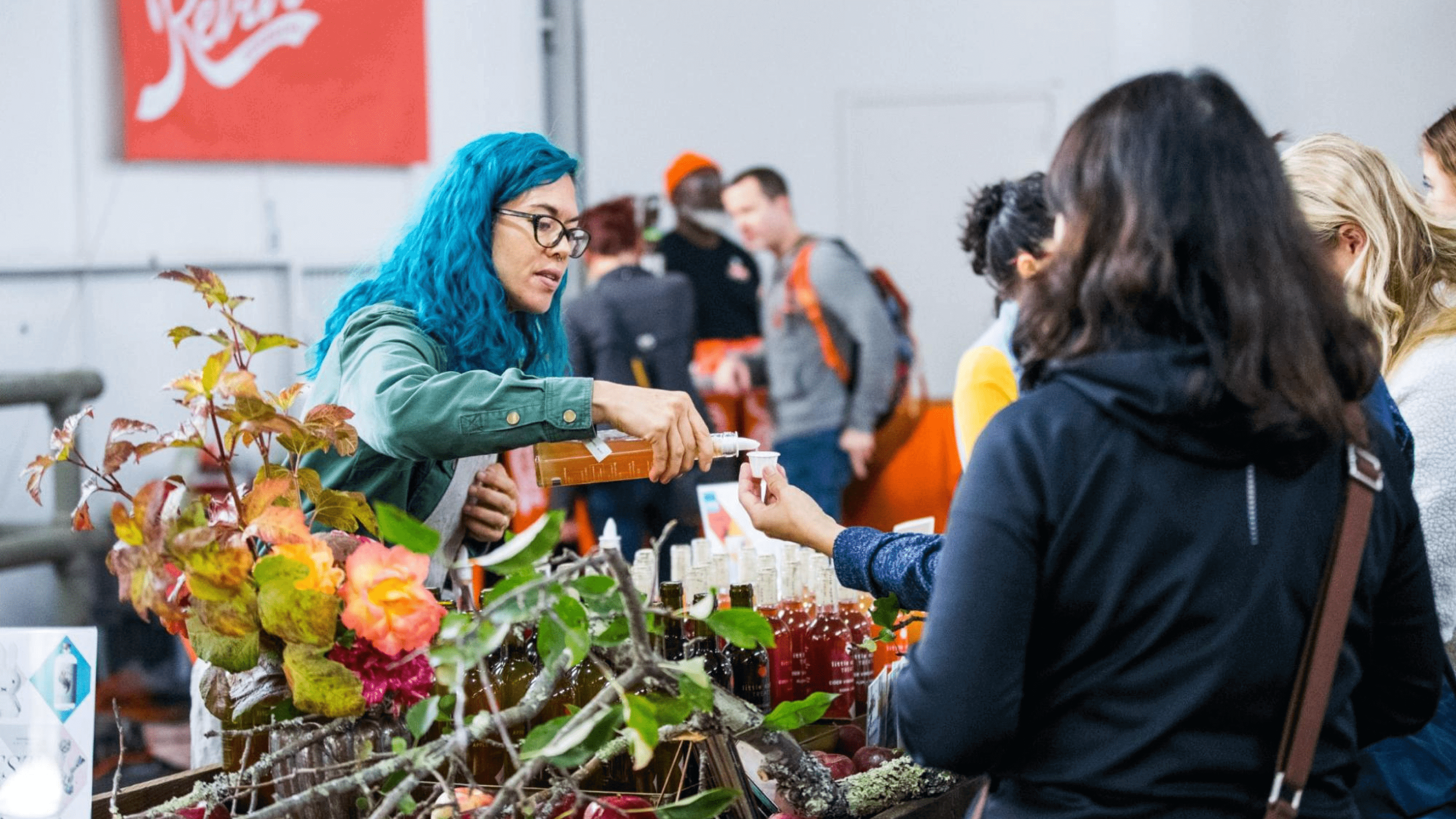 Market stall vendor offers free sample