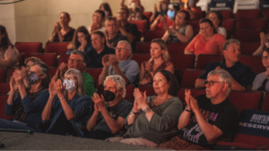 Mountain stage audience clapping