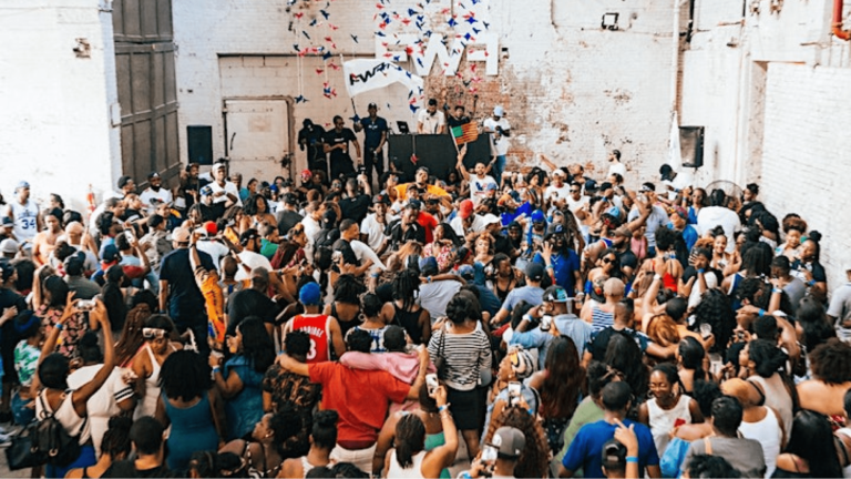 A crowd of people at a block party