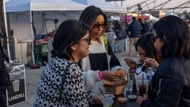 Four people eating and drinking non-alcoholic drinks