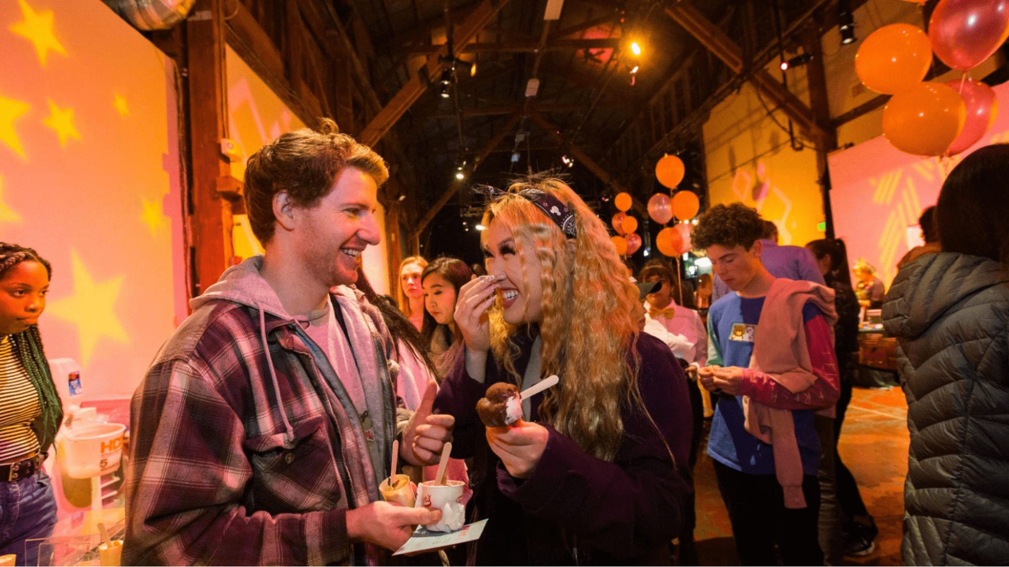 Happy people chatting at a cocktail event